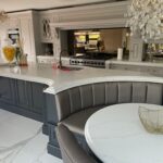 Victorian kitchen with modern island and table seating